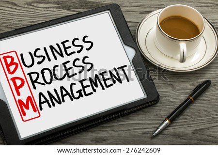BPM concept:business process management handwritten on tablet pc