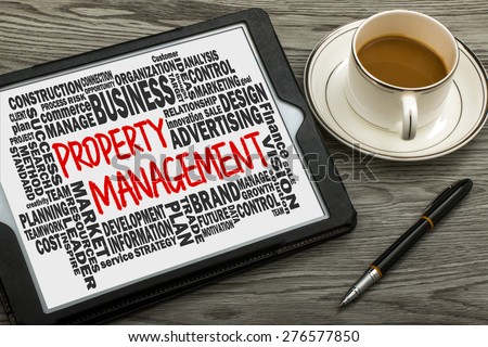 property management concept with related word cloud handwritten on tablet pc
