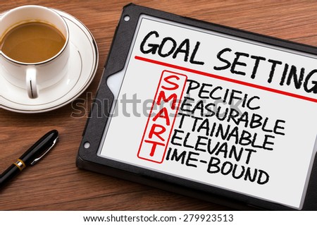 smart goal setting concept hand drawn on tablet pc