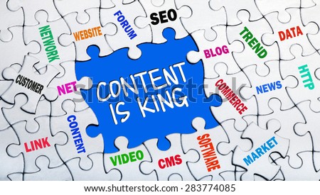 content is king concept with pieces of puzzle showing related tags