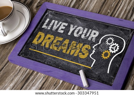 live your dreams concept on blackboard