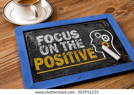 focus on the positive concept on blackboard