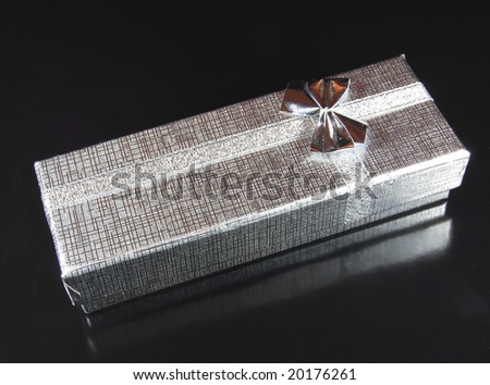 Silver Gift box on black background