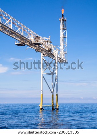 rigs tower with fire in the gulf