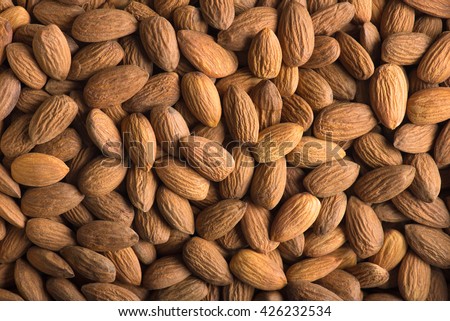 Almonds. Almonds background. Group of almonds. Peeled almonds. Pile of almonds. Almonds kernel. Almonds nuts.