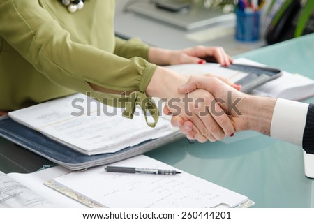 Hand for a handshake. The conclusion of the transaction.