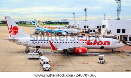 Don Mueang International Airport - air plan thai Lion air, Nok air parking on runway and prepareing to flying at Don Mueang air port on Sep19,2014