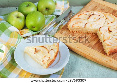 Creamy Apple Pie on a light green wood background