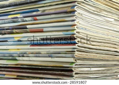 Background of stacked magazines in different colors