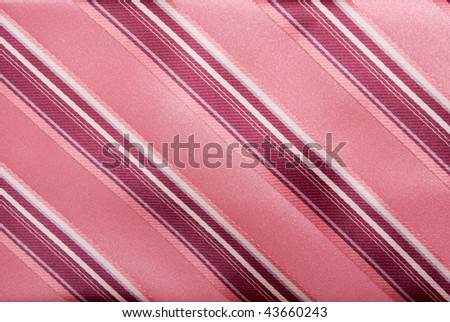 the part of tie material with strips. Textile background.