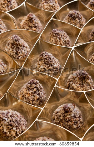 Chocolate sweets in packing from a golden foil