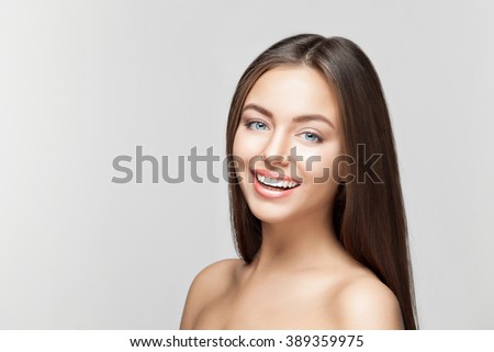 Woman smile. Teeth whitening. Dental care.