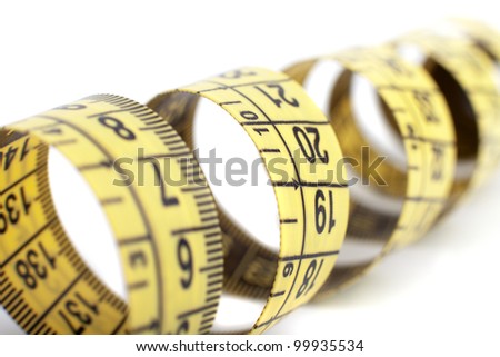 yellow tape measure on the white background