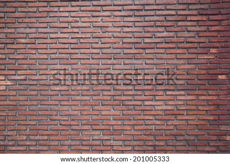 Red brick background: closeup of old  brick wall.