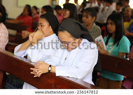UDONTHANI THAILAND- Dec 6: Augustine\'s sisters were praying on the celebation of Our Lady Of Perpetual Help parish.they look very Holy sister on Dec 6 2014 at UDONTHANI THAILAND