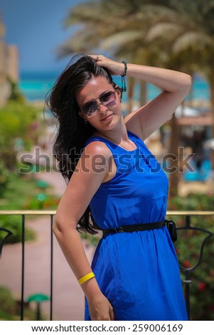 Girl in blue dress. Rest on the red sea. Egypt