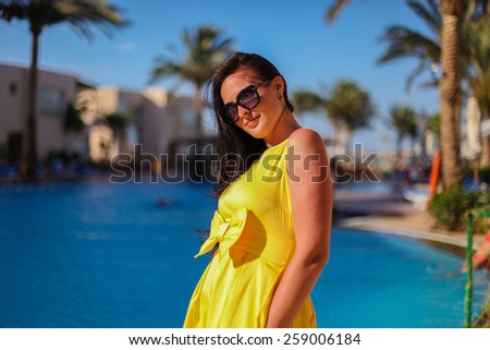 Girl in yellow dress. Rest on the red sea. Egypt