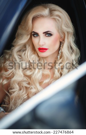 Beauty sexy woman portrait luxury life, Fashionable vogue girl with car bright makeup long blond hair. beautiful blonde lady at sunset. Beautiful fashionable young woman. series