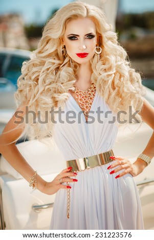 Glamour sexy woman vogue style model on yacht luxury lifestyle, fashionable tanned woman portrait sea vacation, Sensual blonde beautiful woman, Girl with perfect body and long healthy hair,