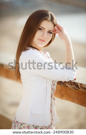 Beautiful woman smiling outdoor, carefree girl enjoying nature, happy woman spring portrait, happy woman at sunset beach, beauty young girl outdoors, series, soft light.