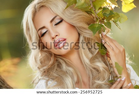 Beautiful woman outdoors spring girl portrait. Smiling young woman outdoors walking. natural beauty female face. Portrait of beautiful blonde lady at sunset series. soft light.