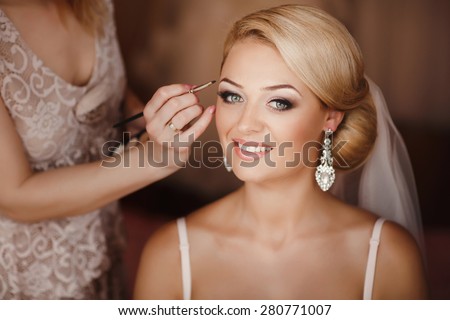 Beautiful Bride Portrait wedding makeup, wedding hairstyle, Wedding dress. Wedding decoration. soft selective focus. gorgeous young bride at home, series