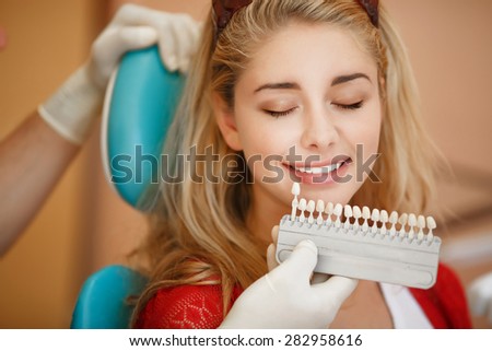 Dentist curing female patient dental care Woman teeth examined at dentists clinic Teeth care and tooth health. selective focus, series