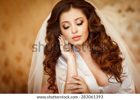 Beautiful Bride Portrait wedding makeup wedding hairstyle Wedding dress. Wedding decoration. Marriage day bride, soft selective focus. gorgeous young bride at home