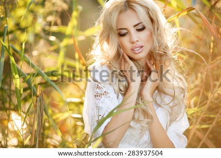 Beautiful woman outdoors portrait natural beauty girl face blonde female skin care. Portrait of beautiful blonde lady at sunset series. soft light.
