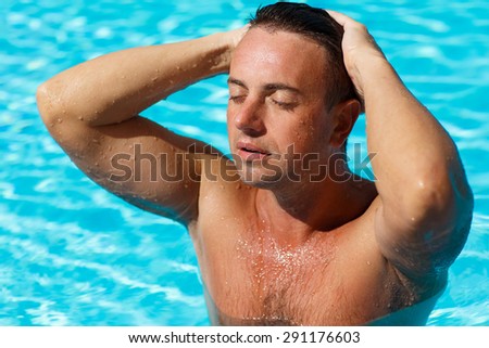 Handsome man at beach pool, sexy male model fit man posing in swimming pool, male model in swimwear at summer vacation, attractive man model outdoor portrait, Man sunbathing on the beach, series
