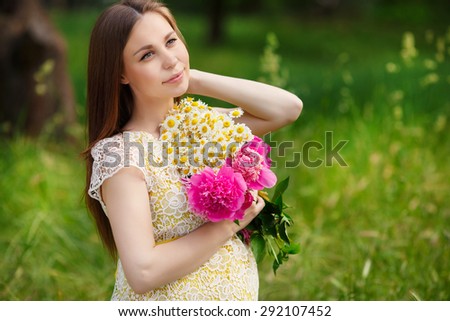Beautiful Pregnant Woman outdoors portrait, pregnant lady with flowers, pregnancy girl portrait healthy pregnancy, pregnant young female in park summer, soft focus. series