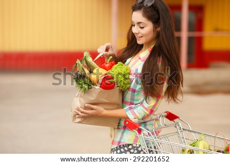Happy woman in market, girl with vegetables at grocery shop, shopping young female with purchase, smiling woman with organic food at supermarket, instagam style filters, series
