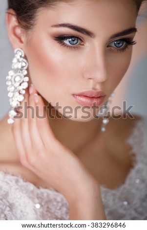 Beautiful Bride portrait wedding makeup and hairstyle with diamond crown, fashion bride model jewelry and beauty girl face, gorgeous beauty bride, isolated , studio, series.