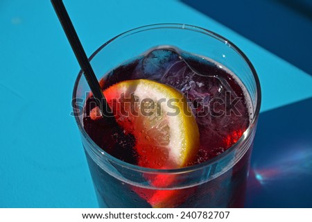 Tinto de verano - Refreshing Andalusian summer wine based drink. Drink made of red wine and soda water with lemon and ice. Very refreshing, great for hot summer days in Andalusia, Spain.