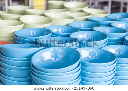 A lot of colorful bowls in a shop