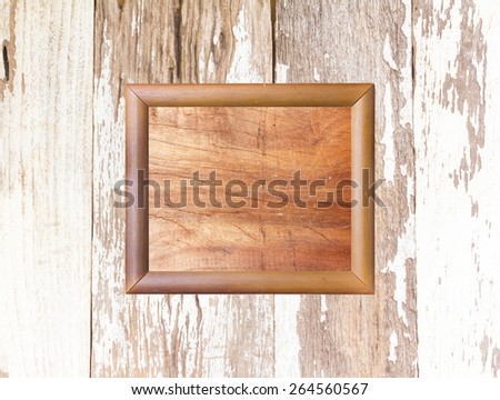 Wood photo image frame on wood background - Vintage effect style pictures