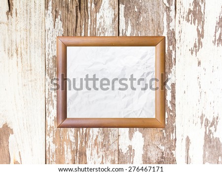 Wood photo image frame on wood background - Vintage effect style pictures