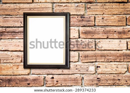 Picture frame on old empty room with concrete wall background vintage effect style