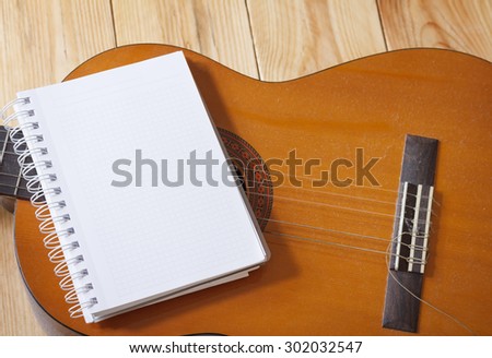 Notebook on guitar for writing music , Concept of music
