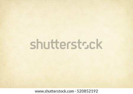 Paper texture light rough textured spotted blank copy space background in beige, yellow, brown