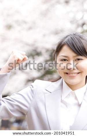 Woman showing victory symbol with fingers