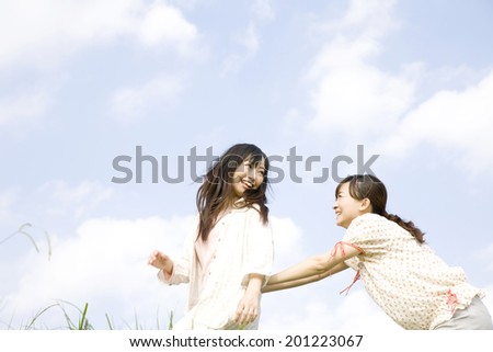 The woman being pushed back by friend