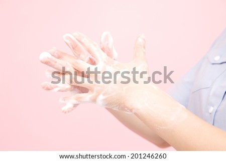 The hand of the woman washing their hands