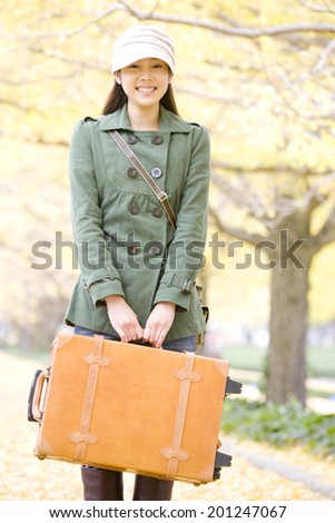 The woman with a carry bag