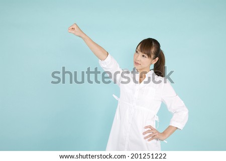 The woman taking a victory pose