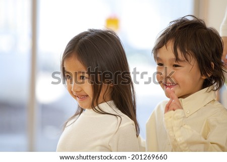 Nursery school children smiling