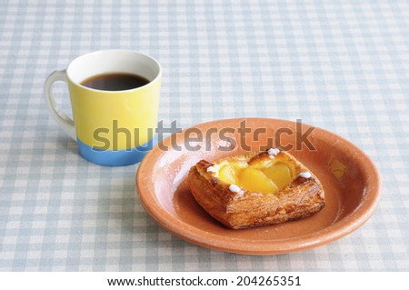 The Apple Bread And Coffee On The Table