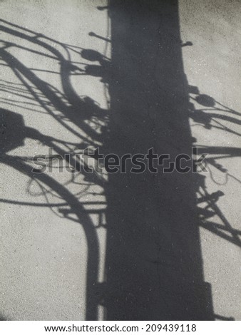 Shadow of the Utility Pole reflected on the Wall