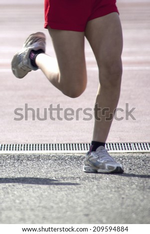 Lower Body of Male Runner running in the Citizen Marathon