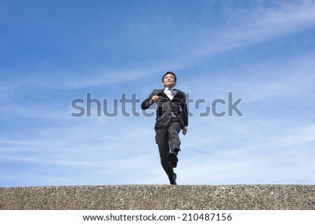 A running business man